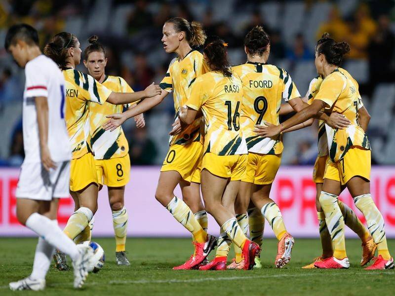 The Matildas celebrate one of Caitlin Foord's three goals in the Olympic qualifying win over Taiwan.