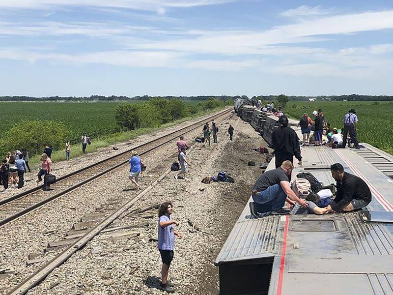 Seven cars derailed after the Amtrak train hit a truck in rural Missouri.