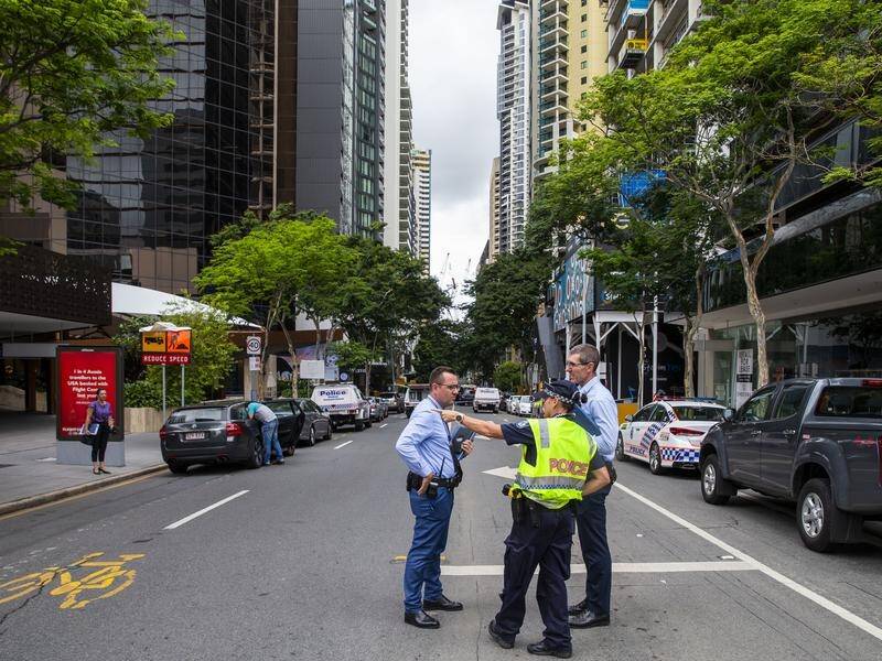 Police are seeking witnesses after a knife-wielding man was shot dead in Brisbane's CBD.
