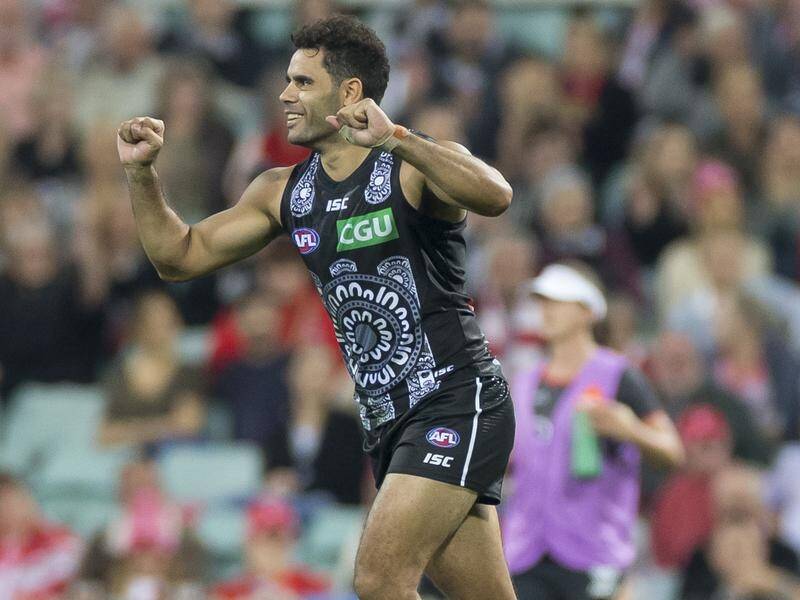 Retiring Magpie Daniel Wells celebrating one of his final AFL goals earlier this year.