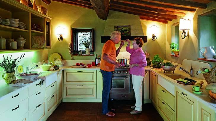 No place like home: Frances Mayes and husband, Ed, in their kitchen in Italy. Photo: Steven Rothfeld