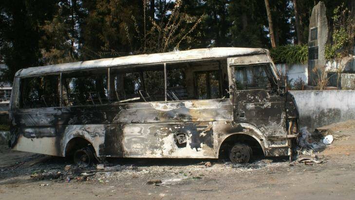 A bus torched in protests by Naga tribesmen over the election. Photo: Amrit Dhillon