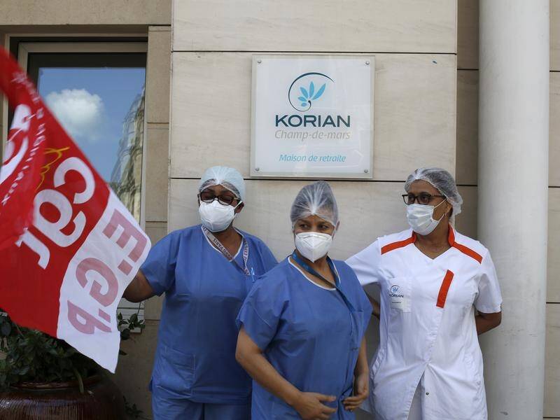 Employees have protested outside a nursing home of the Korian group in Paris.