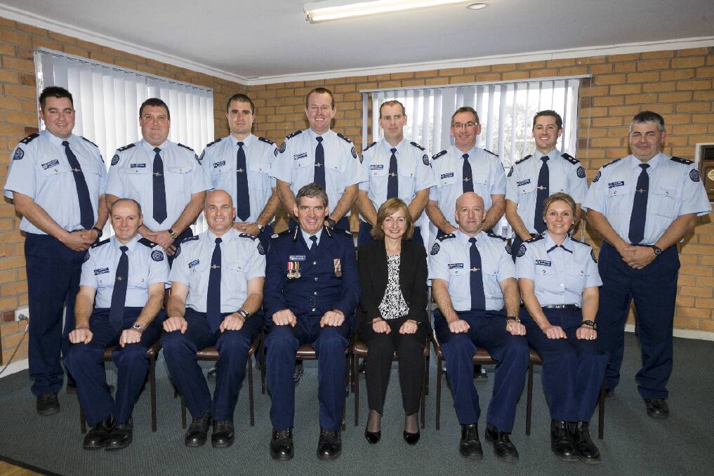 Graduation Squad 2a 2014 with squad manager Nathan Shalders (front, second from left), general manager Patrick McCormick, and regional director Catherine Darbyshire. Pictures: PETER PICKERING