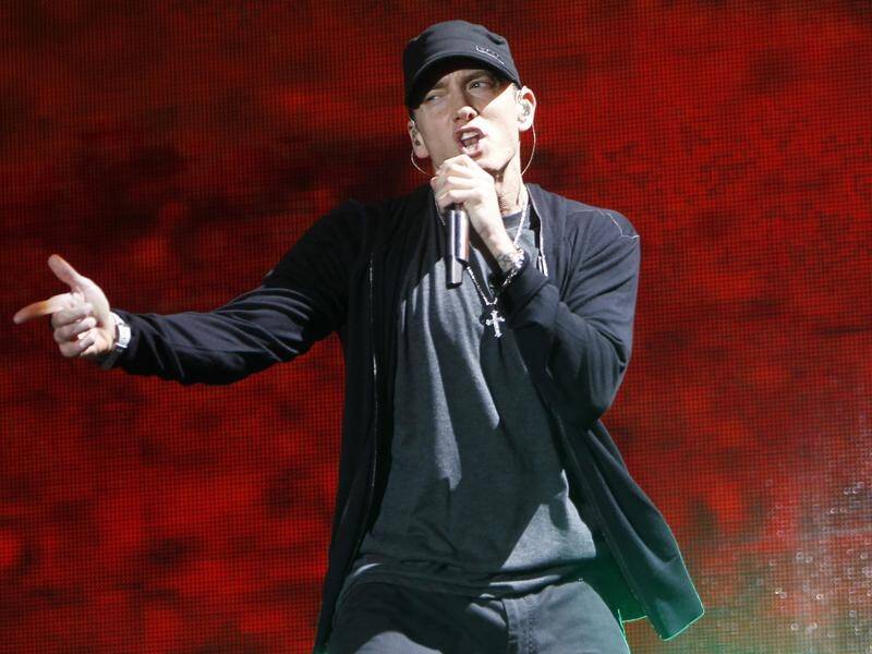 National's copyright payout to US rapper Eminem has been cut by $NZ375,000.
