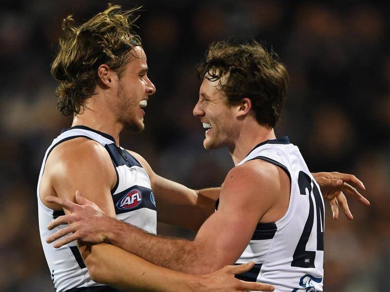 The Cats have extended Adelaide's woeful AFL record in Geelong with a come-from-behind 27-point win.