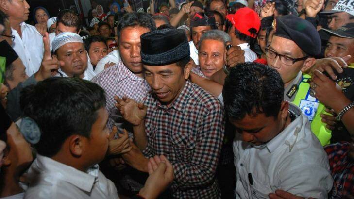 Indonesian presidential candidate Joko Widodo with supporters as he campaigns in Batujajar, West Bandung, in West Java.  Photo: AFP/Timur Matahari