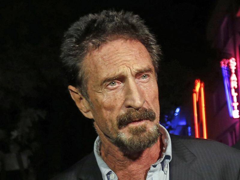 US authorities have charged John McAfee with fraud and money laundering,.
