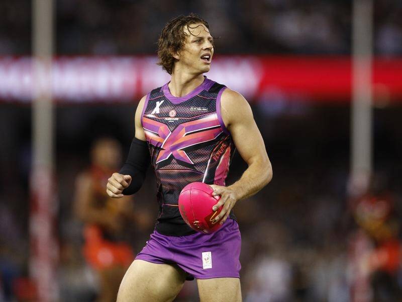Dockers star Nat Fyfe will undergo surgery to mend an elbow injury ahead of the AFL season.