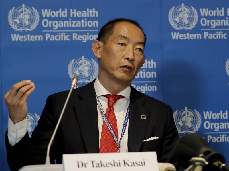 Takeshi Kasai of the WHO has acknowledged being "hard on staff" but rejected charges of racism.