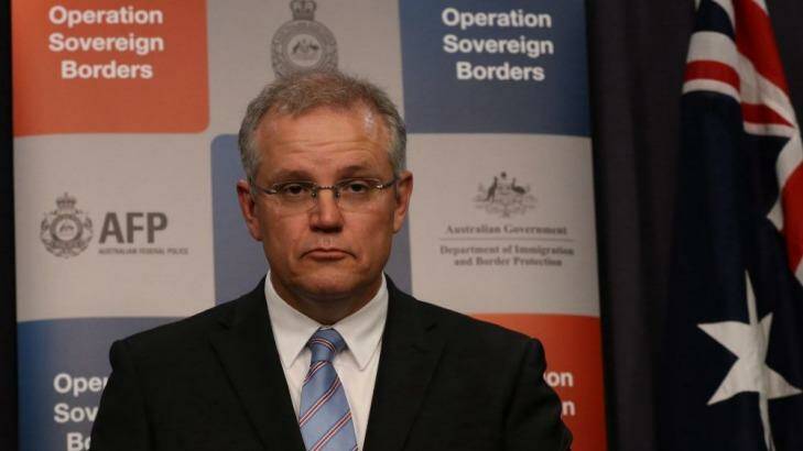 Hard line ... Immigration Minister Scott Morrison can expect questions about whether the Australian navy loaded three asylum seekers from a boat that was turned around in February.   Photo: Andrew Meares
