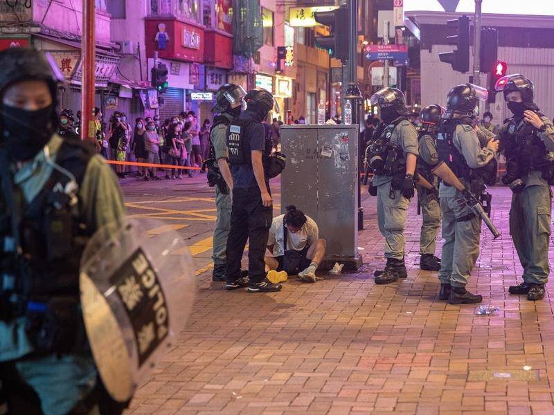 Hong Kong police have arrested hundreds of people amid unrest after a security law came into force.