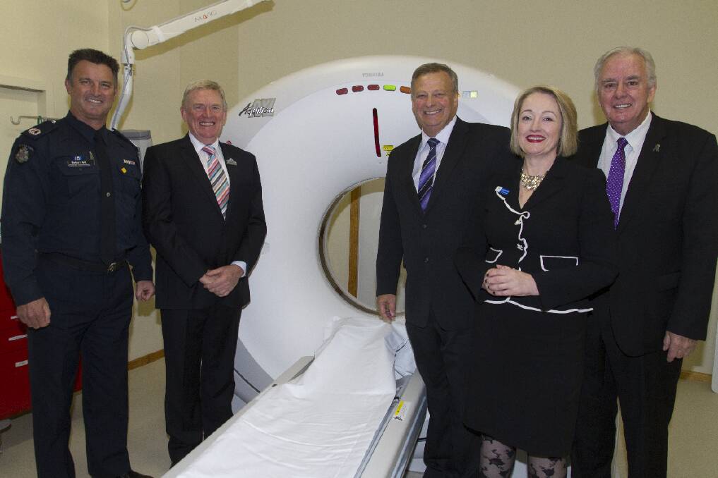 Pictured at the dedication of the new CT scanner at East Grampians Health Service, Assistant Commissioner Robert Hill, Victoria Police Blue Ribbon Foundation Ararat branch chairperson Terry Weeks, Minister for Police and Emergency Services Kim Wells, East Grampians Health Service Board chairperson Louise Staley and Victorian Police Blue Ribbon Foundation chairperson Bill Noonan. Picture: PETER PICKERING