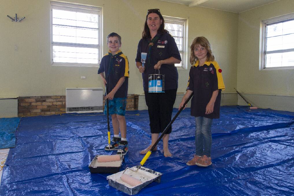 Ashley, Belinda Graham and Olivia with paint ready to go at the Scout hall. Pictures: PETER PICKERING