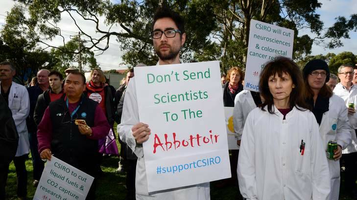 Scientists protest over $115 million in cuts outside the CSIRO's Clayton site on Thursday. Photo: Penny Stephens