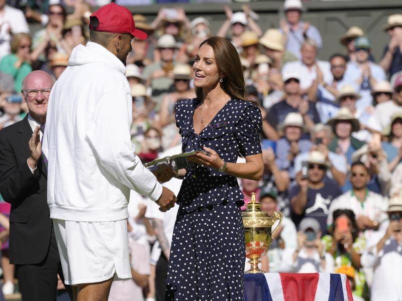 The Duchess of Cambridge presents the runner-up trophy to Nick Kyrgios after the Wimbledon final.