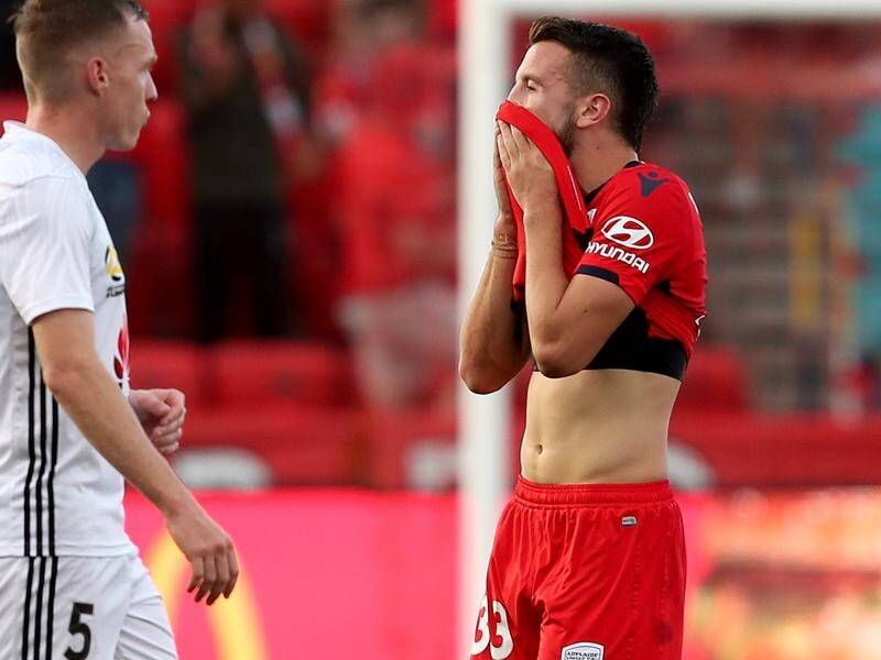 Stamatelopoulos reacts to his red card after starring during Adelaide's win against Wellington.