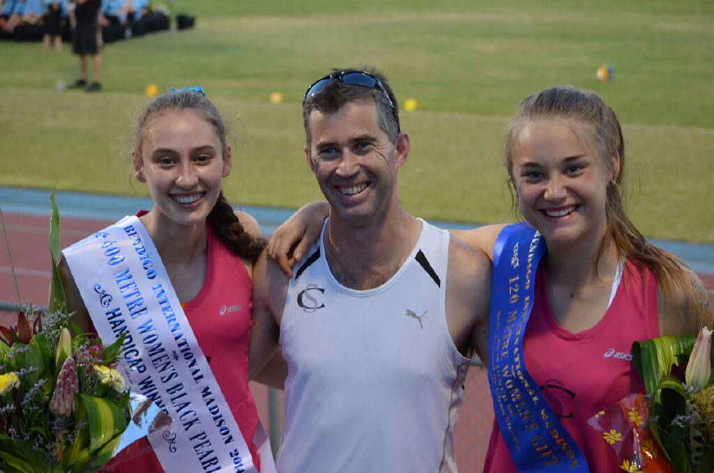 Proud coach Marcus Cooper celebrates with 400-metre Black Opal winner Tiffany Boatman (left) and Women s Gift winner Sarah Blizzard on Sunday. Picture: CONTRIBUTED