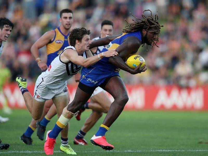 Nic Naitanui (r) will be a key figure for the Eagles this season after returning from injury.