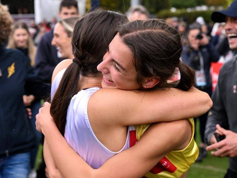 Defending women's Stawell Gift winner Bella Pasquali (right) will be 17 years old at this year's event. Picture by James Ross/AAP PHOTOS