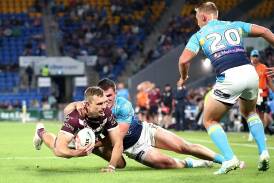 Tom Trbojevic had an unusually sloppy night but still scored twice as Manly saw off the Titans. (Jason O'BRIEN/AAP PHOTOS)