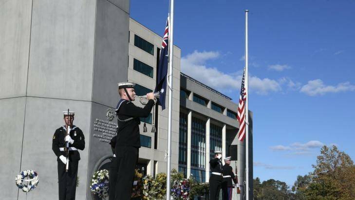 The Last Post is played during the Battle of the Coral Sea commemoration at Field Marshal Sir Thomas Blamey Square     in Russell.  Photo: Jeffrey Chan