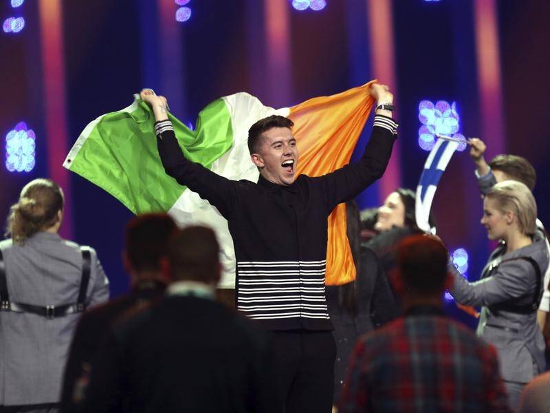 Ireland's Ryan O'Shaughnessy celebrates after making it through to Eurovision's grand final.