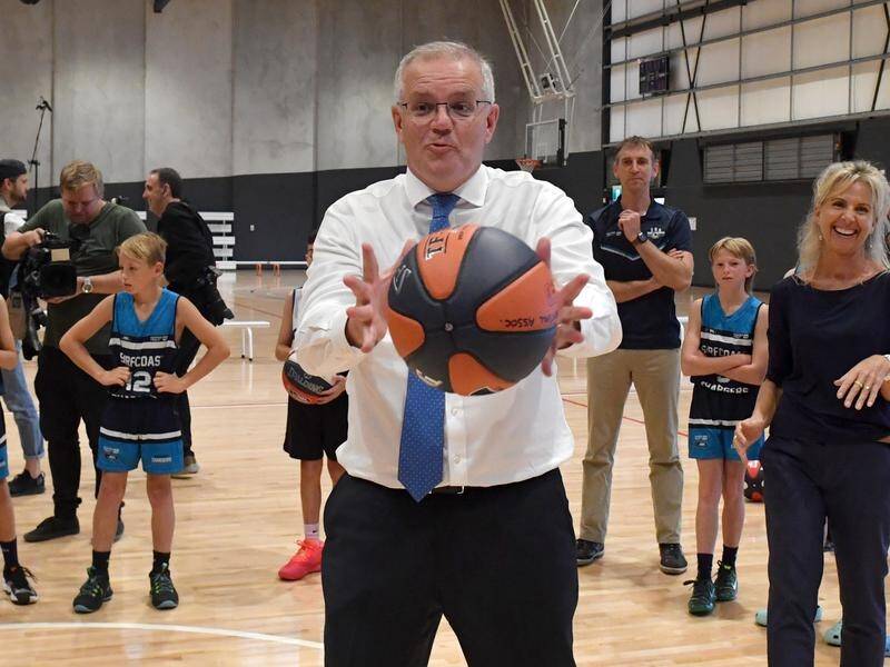 Prime Minister Scott Morrison ran through basketball drills with kids in a marginal Victorian seat.