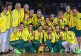 NETBALL, DAY 11: The Australian team pose with their gold medals after victory in the gold medal netball match. Photo: GETTY IMAGES
