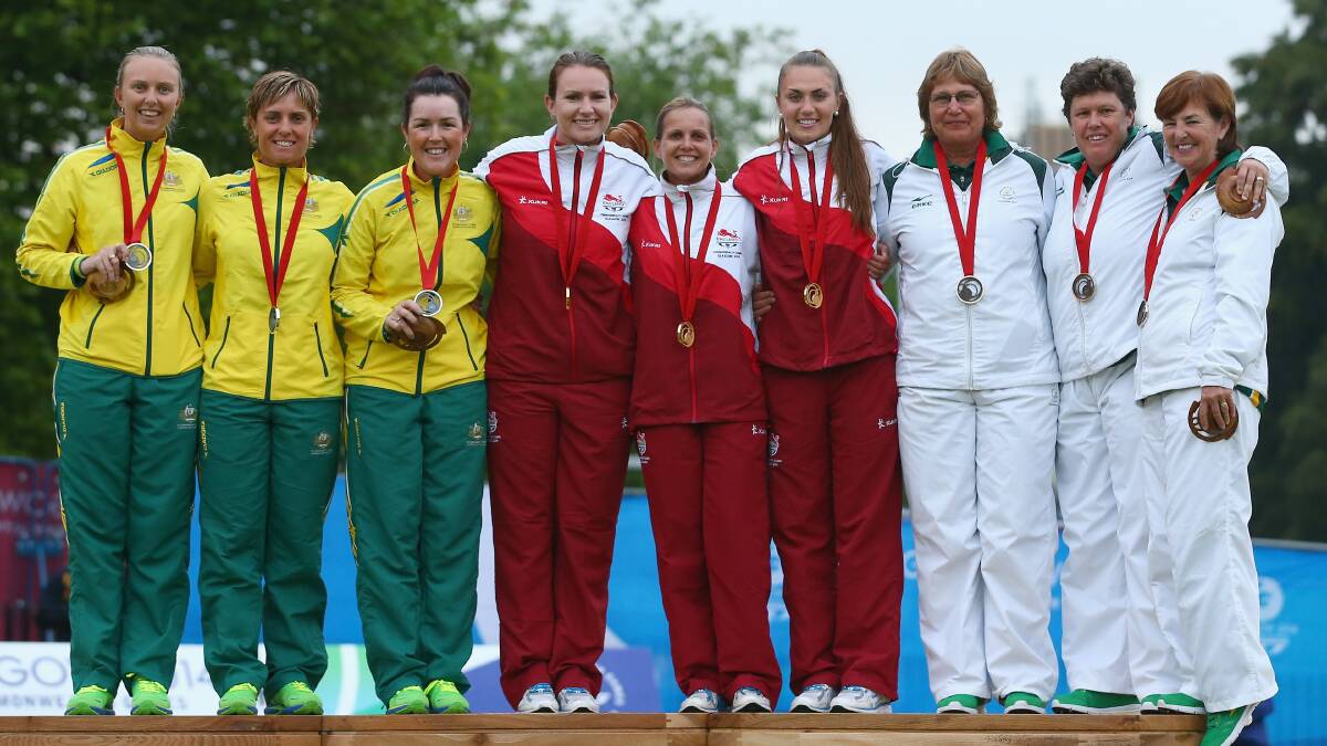 Silver medalists Kelsey Cotterell, Karen Murphy and Lynsey Clarke of Australia, gold medalists Sian Gordon, Ellen Falkner and Sophie Tolchard of England and bronze medalists Susan Nel, Santjie Steyn and Esme Steyn of South Africa pose with thier medals for the women's triples final at Kelvingrove Lawn Bowls Centre during day eight of the Glasgow 2014 Commonwealth Games. PICTURE: GETTY