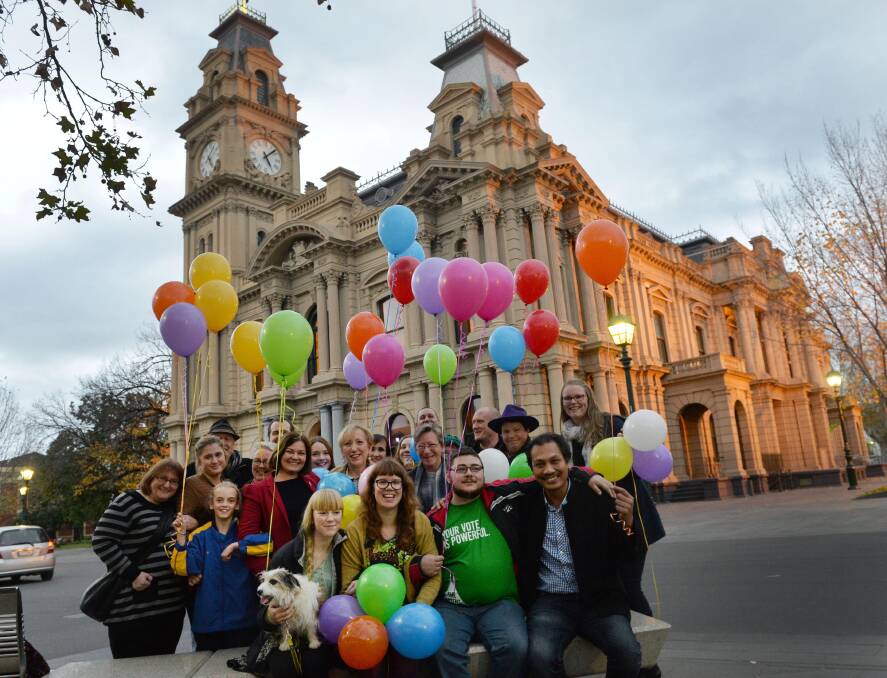 Rainbow balloons fly in support of diversity