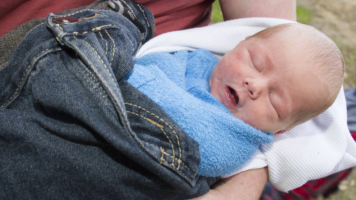 One week old Ryan, swaddled in a pair of dad’s jeans.