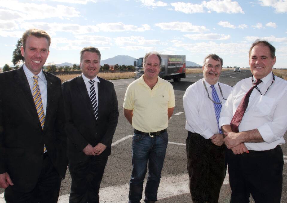 Member for Wannon Dan Tehan, Assistant Minister for Infrastructure and Regional Development Jamie Briggs, Mayor Cr Paul Hooper with Ararat Rural City’s director council services Neil Manning and CEO Andrew Evans discuss the bypass on the Western Highway east of Ararat.
