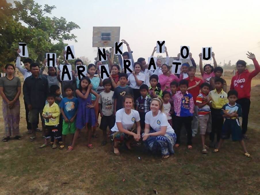 Abby Main and Ellie Price with children and staff from the orphanage who are grateful for the assistance of the local Ararat and district community. 