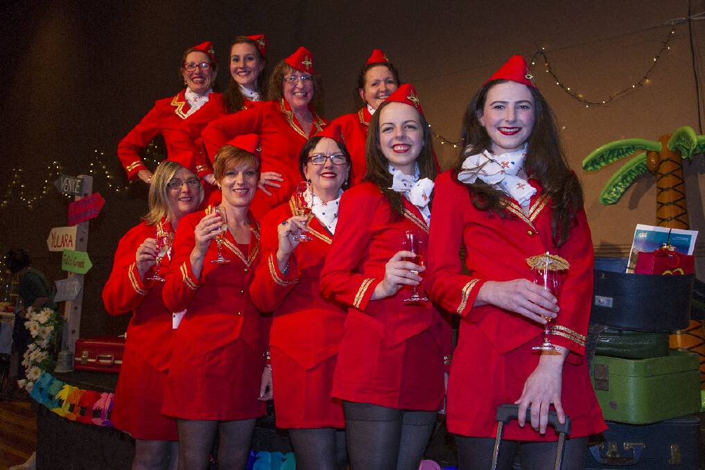 Air Hostesses, from back Jill Brennan, Phoebe Venables, Cathy Nicholson, Nina Henry, front, Bernadette Perovic, Linda Hosking, Janet Todd, Phoebe Todd and Jess Stoneman at the East Grampians Health Service's holiday themed WWW Dinner. More pictures in tomorrow's Ararat Advertiser.
