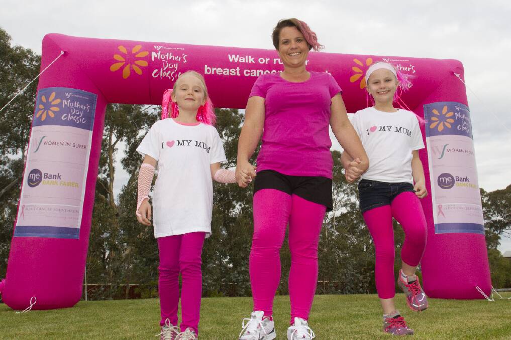 The Biggest Loser ﬁnalist Sharon Basset, pictured with daughters Makala and Ashley, will be leading the warm up for this year’s Mother’s Day Classic. Picture: PETER PICKERING