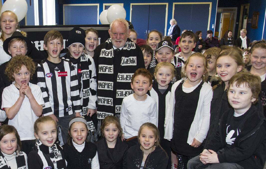 Ararat’s popular Catholic parish priest Father Brendan Davey will retire this month after 53 years in the priesthood and 27 years in Ararat. St Mary’s Primary School held their own farewell for Father Davey yesterday and in his honour, everyone donned the black and white of his beloved Collingwood. Picture: PETER PICKERING