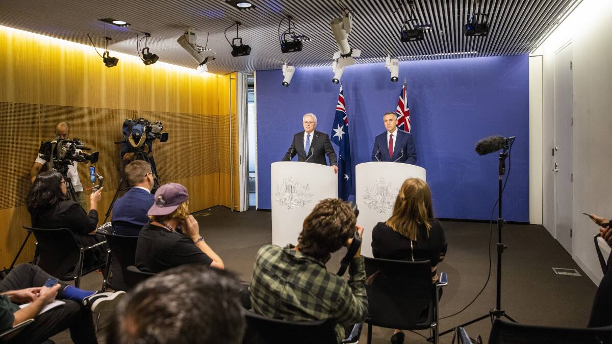 Prime Minister Scott Morrison with Veterans' Affairs Minister Darren Chester announcing the royal commission into veteran suicide. Picture: Getty Images