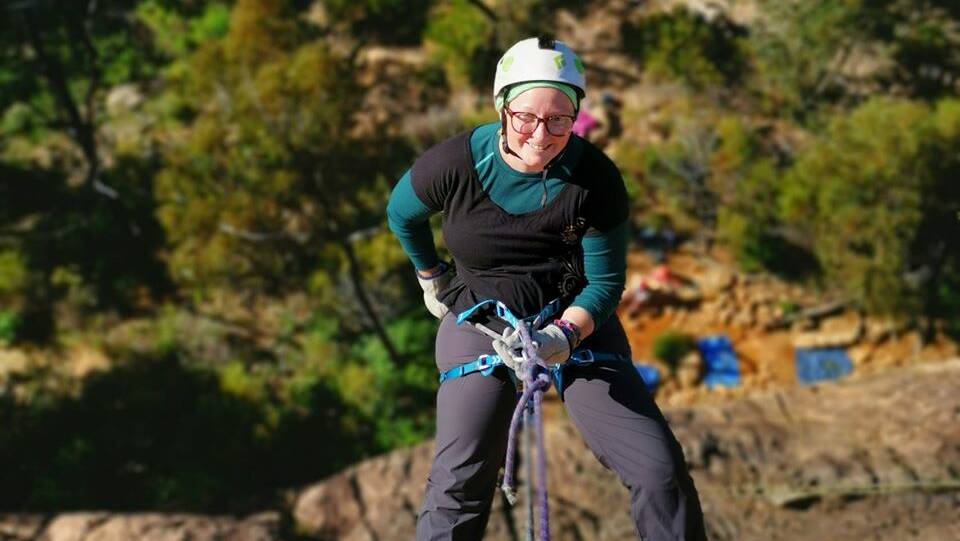 GREAT HEIGHTS: Krisitie enjoys abseiling at her fundraiser in the Summerday Valley. Picture: CONTRIBUTED