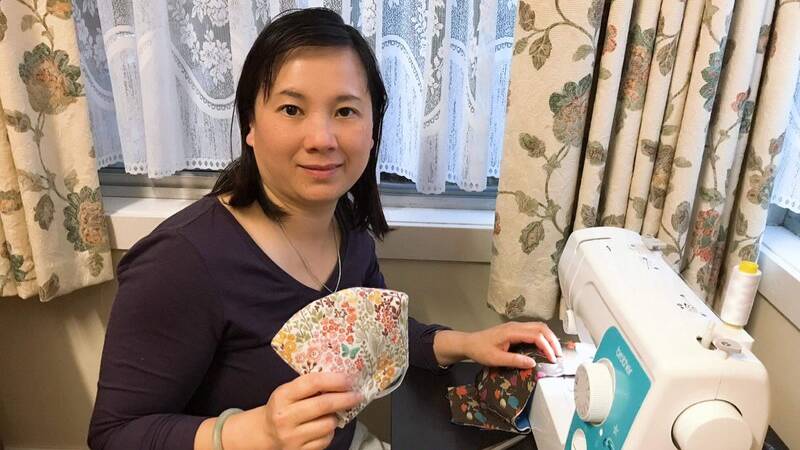 SEWING HOBBY: English language student Phuong Dung Ha making face masks at her home. Picture: CONTRIBUTED 