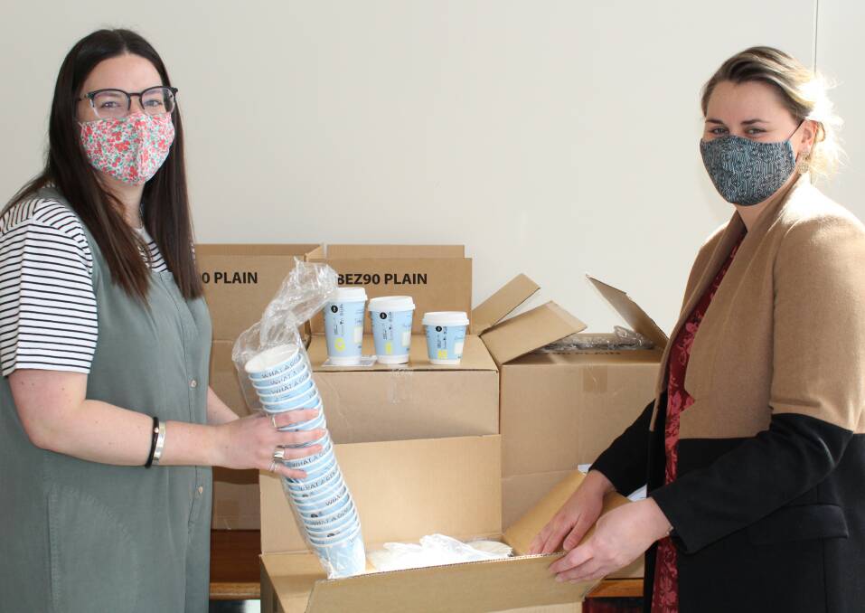 COFFEE INTIATIVE: Resilient Ararat project officer Jane Moriarty and Central Grampians Local Learning and Employment Network executive officer Jessica Paterson with #beanresilient cups. Picture: CONTRIBUTED 