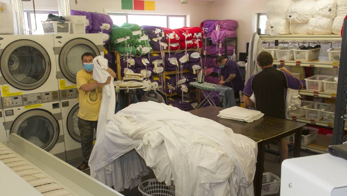 ESSENTIAL SERVICE: The Commercial Laundry provides services to hospitals and aged care facilities. Picture: PETER PICKERING 