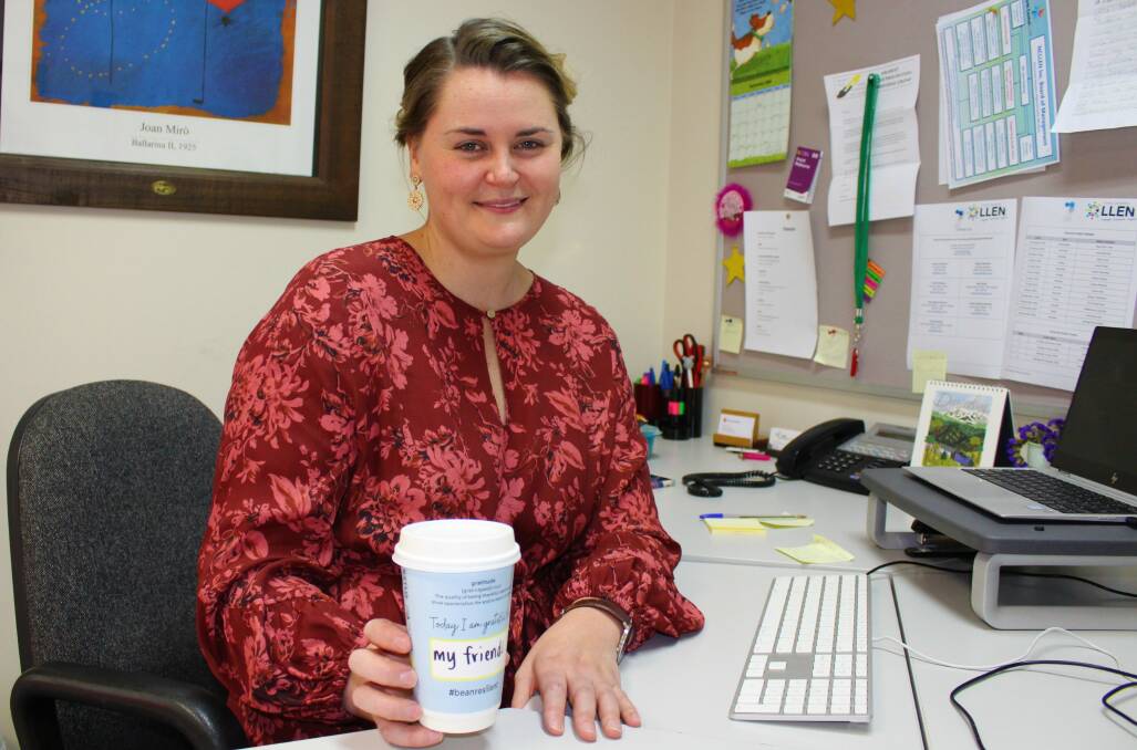POSITIVE CUPS: CGLLEN executive officer Jessica Paterson enjoys a coffee ahead of the upcoming #beanresilient campaign. Picture: CONTRIBUTED 