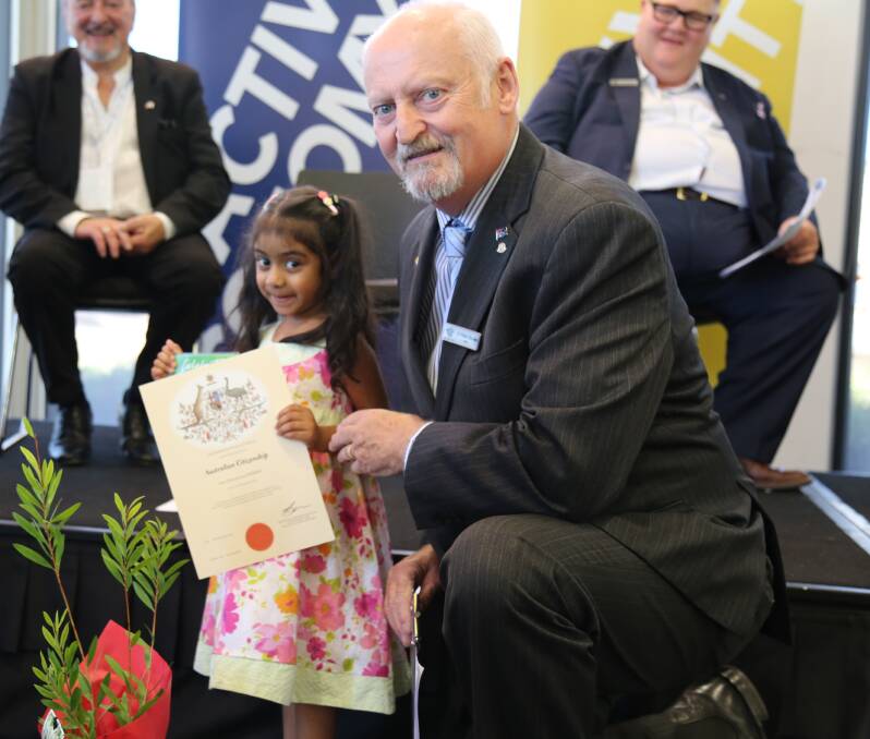 LOOKING FORWARD: Mayor Cr Peter Beales with Ararat’s youngest new citizen Inez Perera during the ceremony. Inez has a bright and exciting future ahead.