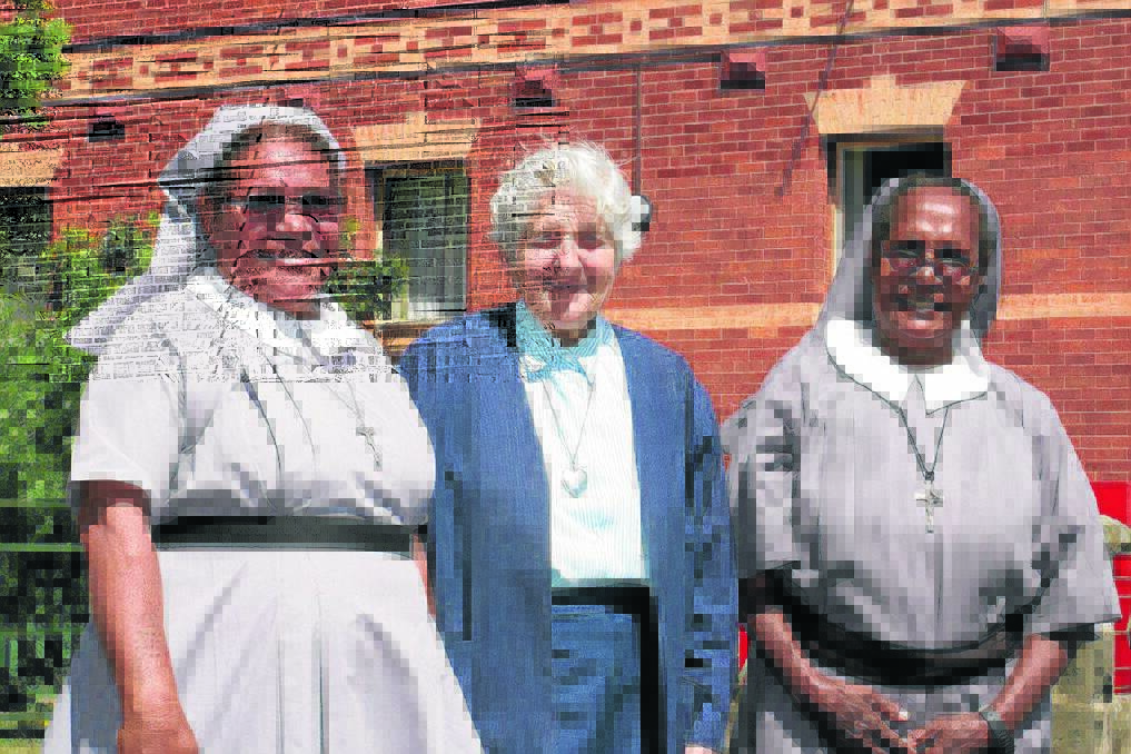 Sister John, centre, with Papuan visitors Sister Joanne and Sister Helen. Picture: PETER PICKERING