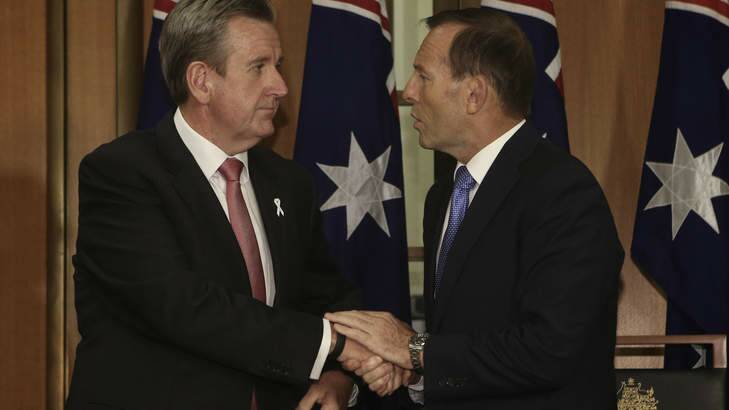 Prime Minister Tony Abbott and NSW Premier Barry O'Farrell sign the Murray-Darling Basin agreement. Photo: Andrew Meares