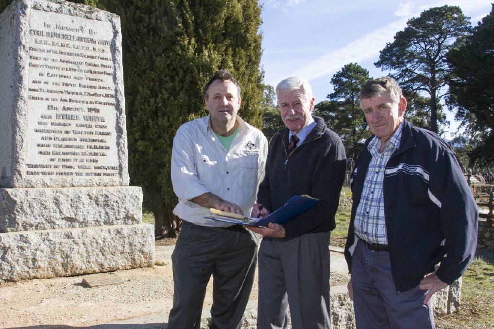 Craig Henderson, state manger, Office of Australian War Graves, Russell Rachinger, Ararat Legacy and Tim White, descendant of General Sir Brudenell White, viewing the memorial to General Sir Brudenell White while Mr Henderson was inspecting the graves of war veterans at the Buangor Cemetery. 