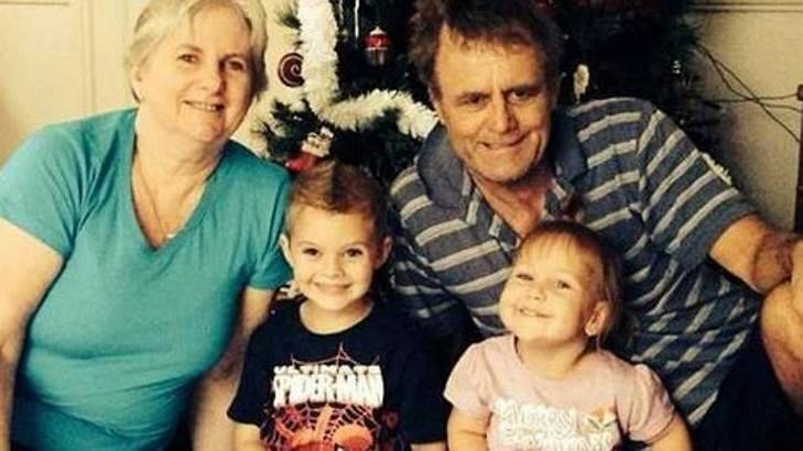 Missing: Catherine and Robert Lawton of Springfield Lakes with their grandchildren. Photo: Facebook