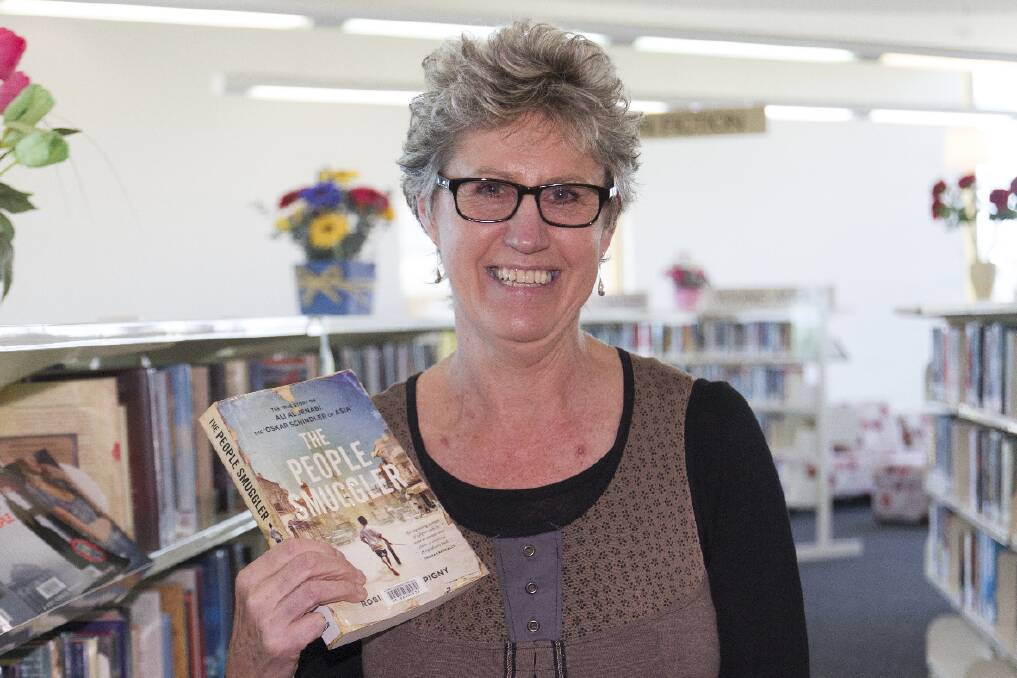 Author Robin de Crespigny with her book, The People Smuggler , at the Ararat Library. Picture: PETER PICKERING