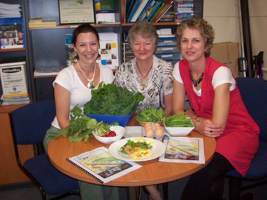 Emily Anderson, Meagan Ward and Marlene Goudie preparing for the 'Food for All' forum.